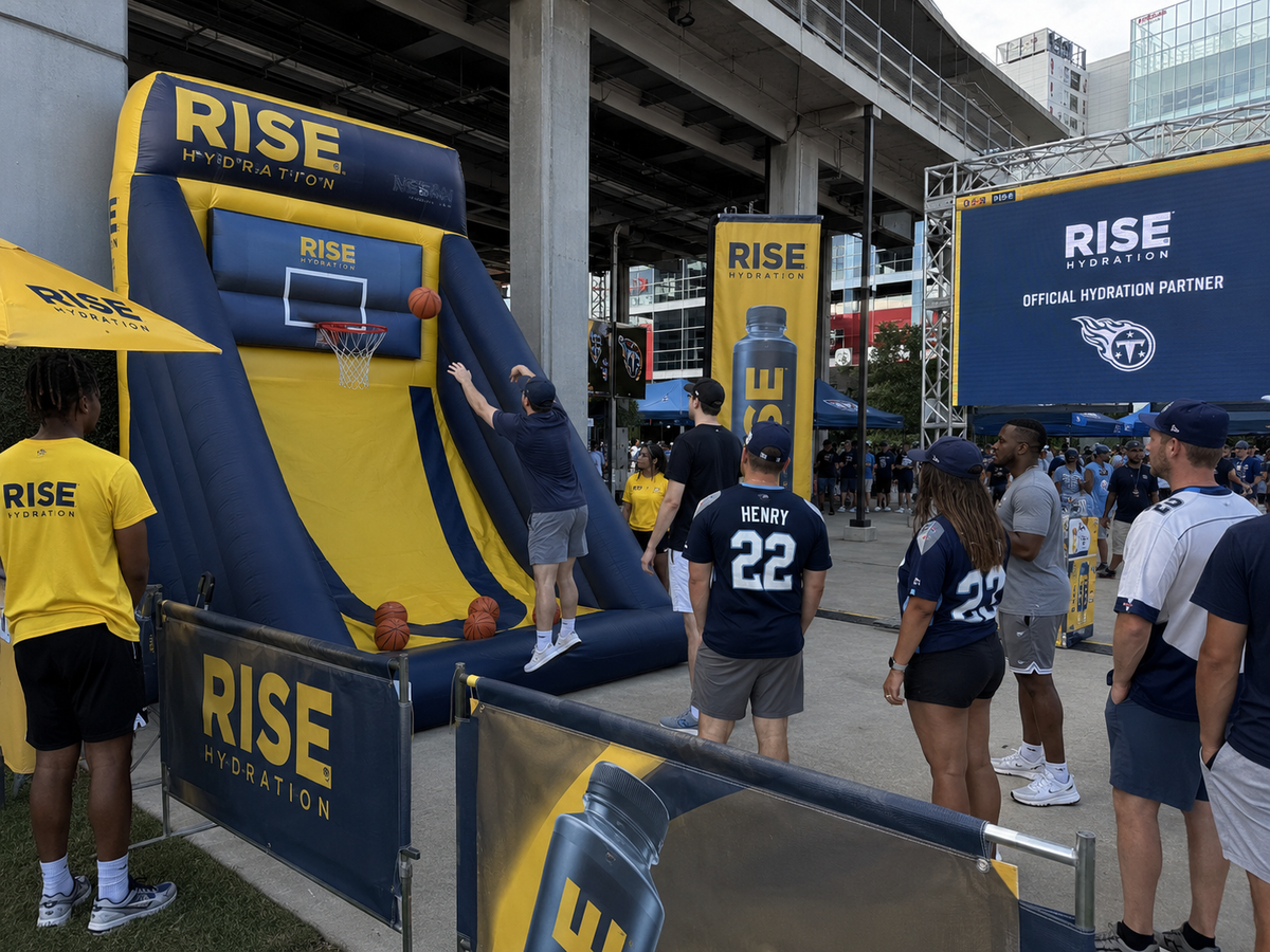 Branded interactive inflatable basketball game installed at a sports fan activation